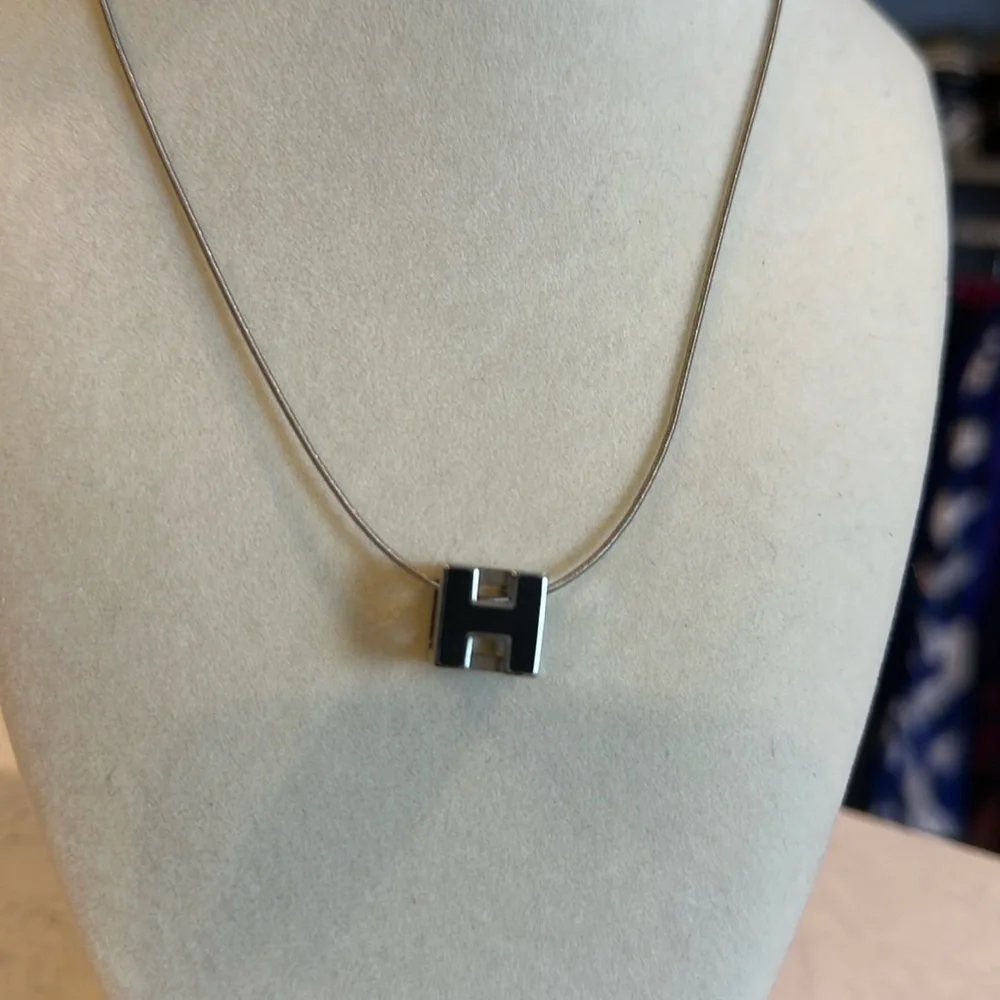 Authentic Hermes black logo silver tone 16” long necklace